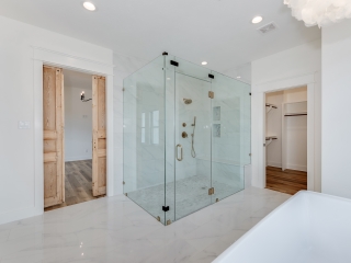 The Homestead Project's master bath with glass shower by LaFollette Custom Homes.