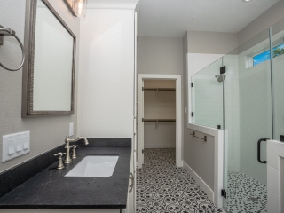Master bath of the Cedar Project with tile flooring.
