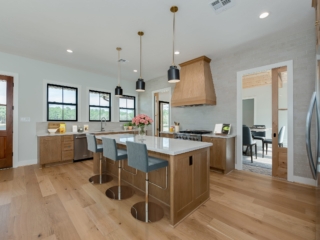 Kitchen of the WLS Project by LaFollette Custom Homes with wood features.