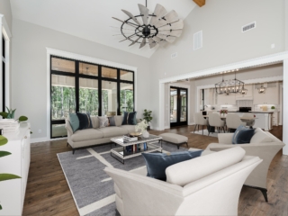 Living room of the Silo Project by LaFollette Custom Homes with blue and cream details.