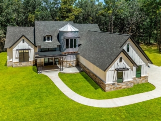 The Torres Project by LaFollette Custom Homes with a silo structure.