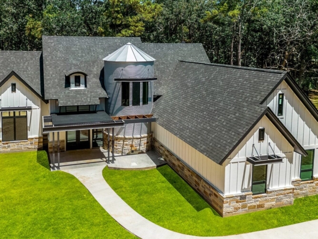 The Silo Project by LaFollette Custom Homes with a silo structure.