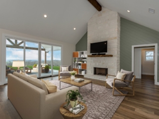 Living room of the Axis Project by LaFollette Custom Homes featuring large glass sliding doors.
