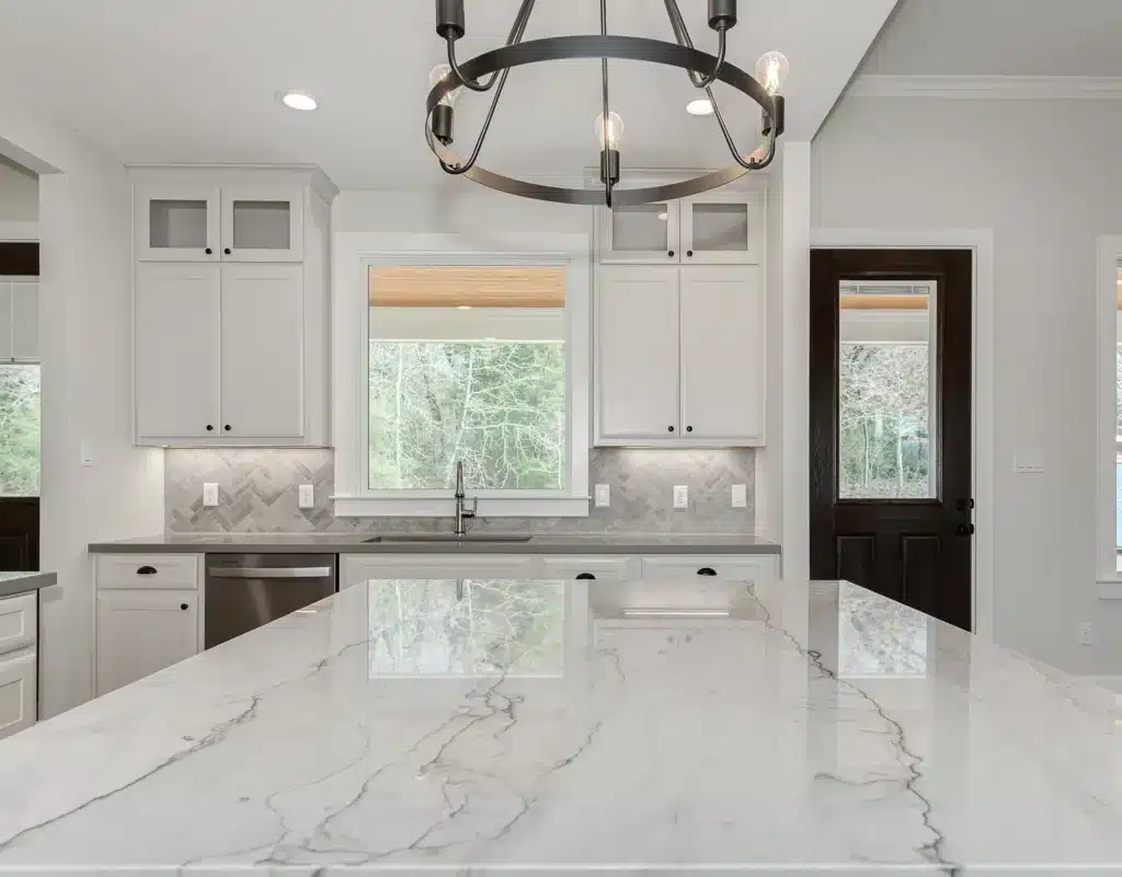 Current image: marble white counter tops, white kitchen, Designing Your Dream Custom Home with Energy Efficiency in Mind