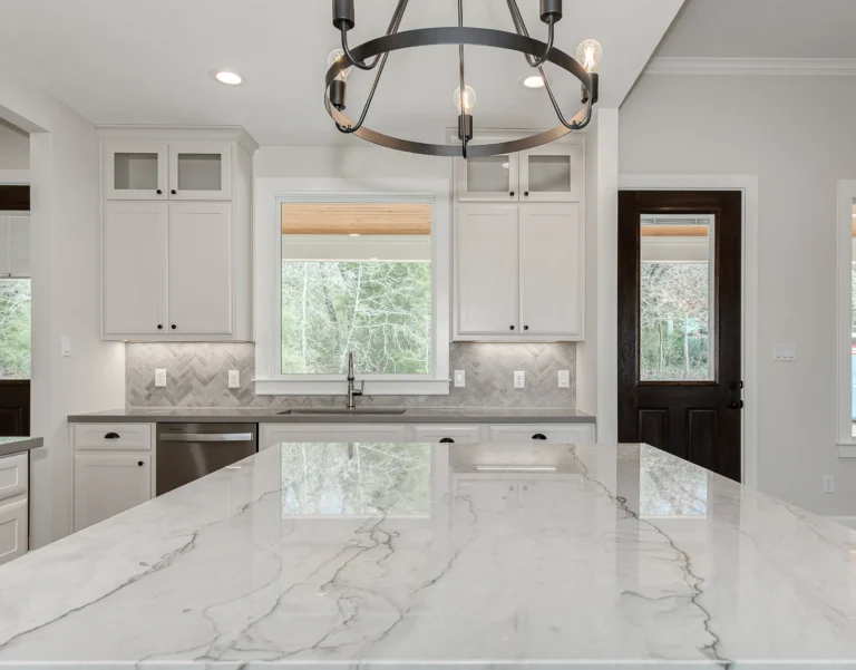 marble white counter tops, white kitchen, Designing Your Dream Custom Home with Energy Efficiency in Mind
