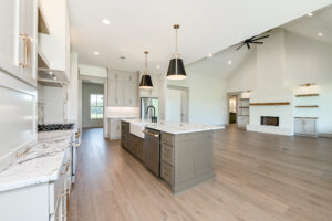 LaFollette Custom Homes interior showing a functional custom home layout with open-concept kitchen, large island, and spacious living area.