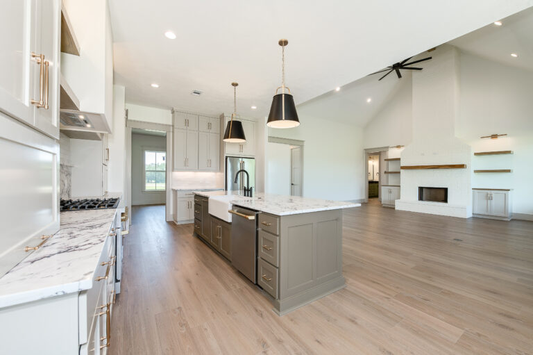 LaFollette Custom Homes interior showing a functional custom home layout with open-concept kitchen, large island, and spacious living area.