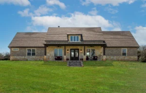 Custom home building mistakes guide featuring a finished LaFollette Custom Homes exterior