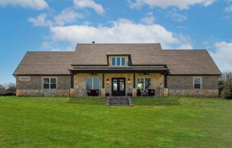 Custom home building mistakes guide featuring a finished LaFollette Custom Homes exterior