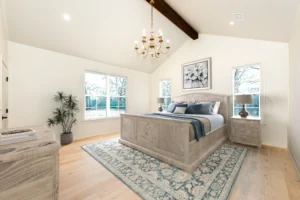 Custom home bedroom showing comfortable design and floor plan details by LaFollette Custom Homes